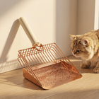 FELVO Timber Scoop, Wood-Handled Metal Litter Scoop in use