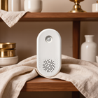 FELVO Still Air, Rechargeable Litter Deodorizer styled in a warm modern interior
